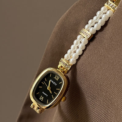 Relógio feminino oval com disco simples e fashion de pérola